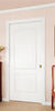 White Camden door in a room with a wooden desk, chair, and painting on the wall.