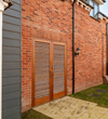 Pair Softwood Louvre doors Inc Frame & Cill
